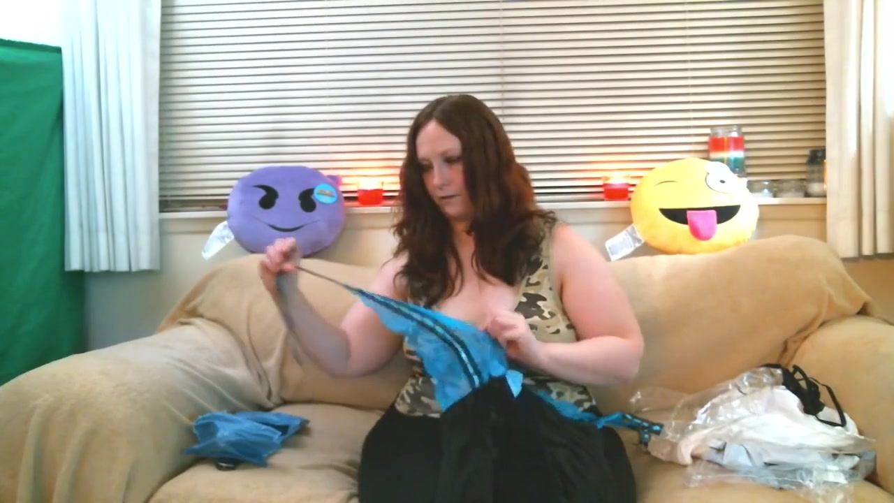 thick redhead tries on some clothes and shows off her ass and tight pussy