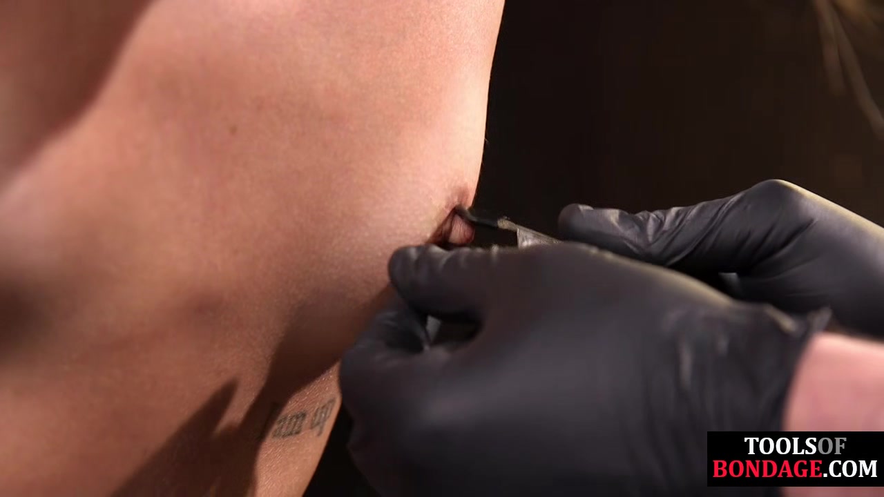 Bound submissive nipple clamped and gagged by her domme