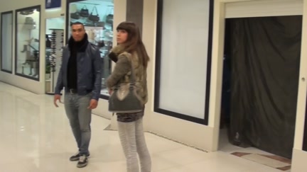 Brown gal sucks jocks in the mall