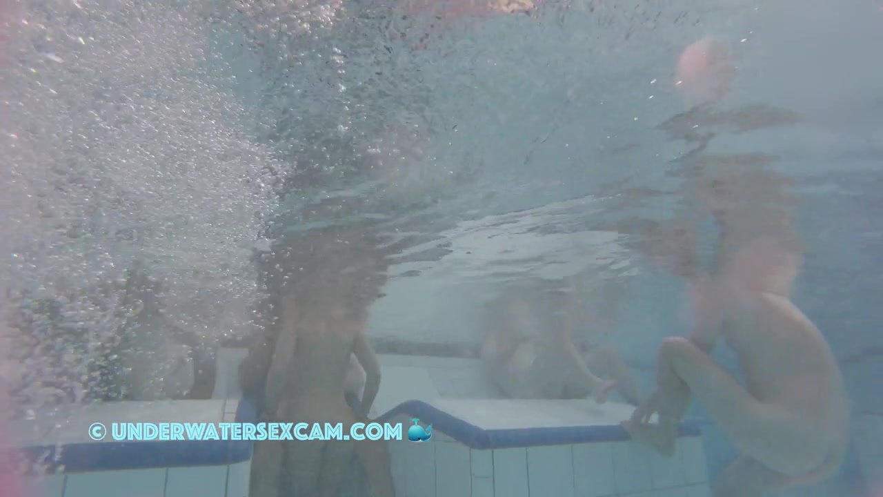 This Young Couple Plays Together Underwater In Front Of Many People