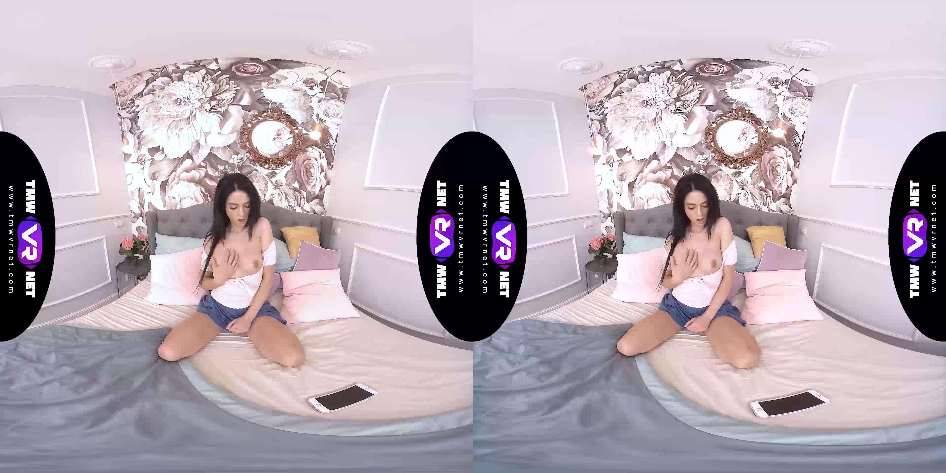 Orgasming with a phone in her hands
