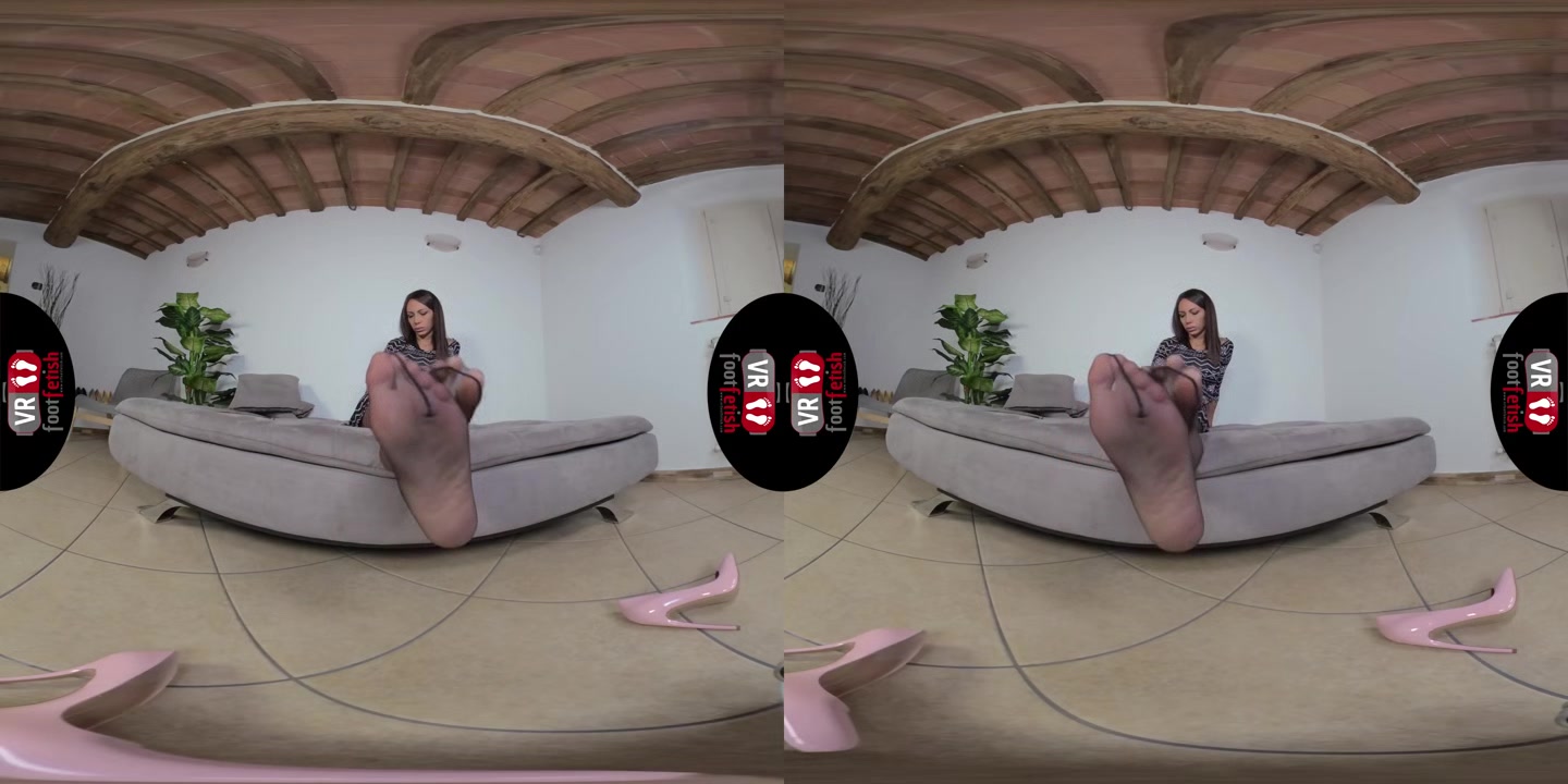 Stunningly Beautiful Daniela Lets Her Pink Stilettos Dangle Off Her Feet - VRFootFetish