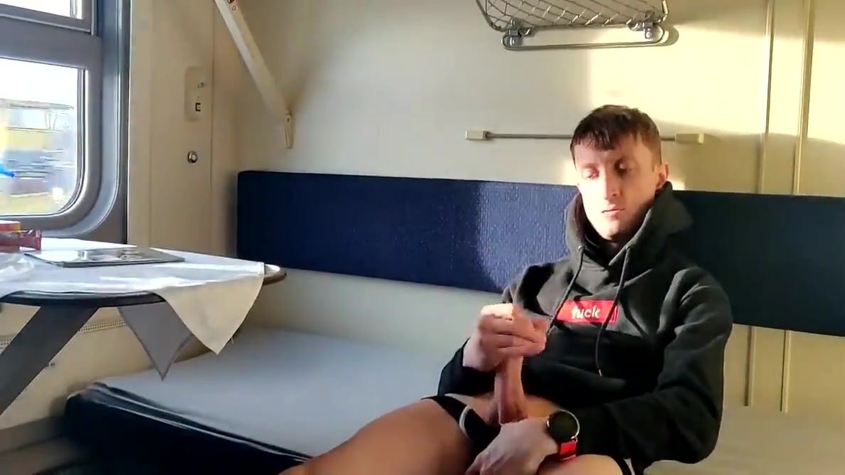 Masturbating In A Train Cabin While Wearing Hoodie And Shorts