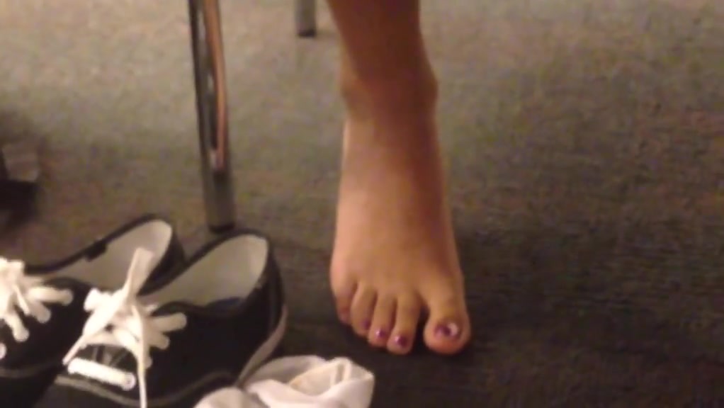 Candid sexy indian feet socks off at library