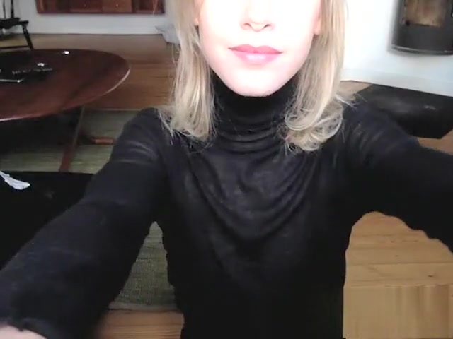 Kate May In A black suit On The Floor With A dildo