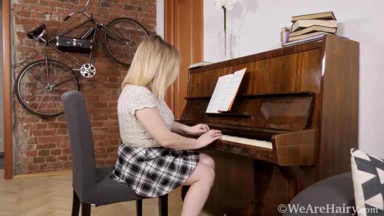 Lina masturbates after playing the piano