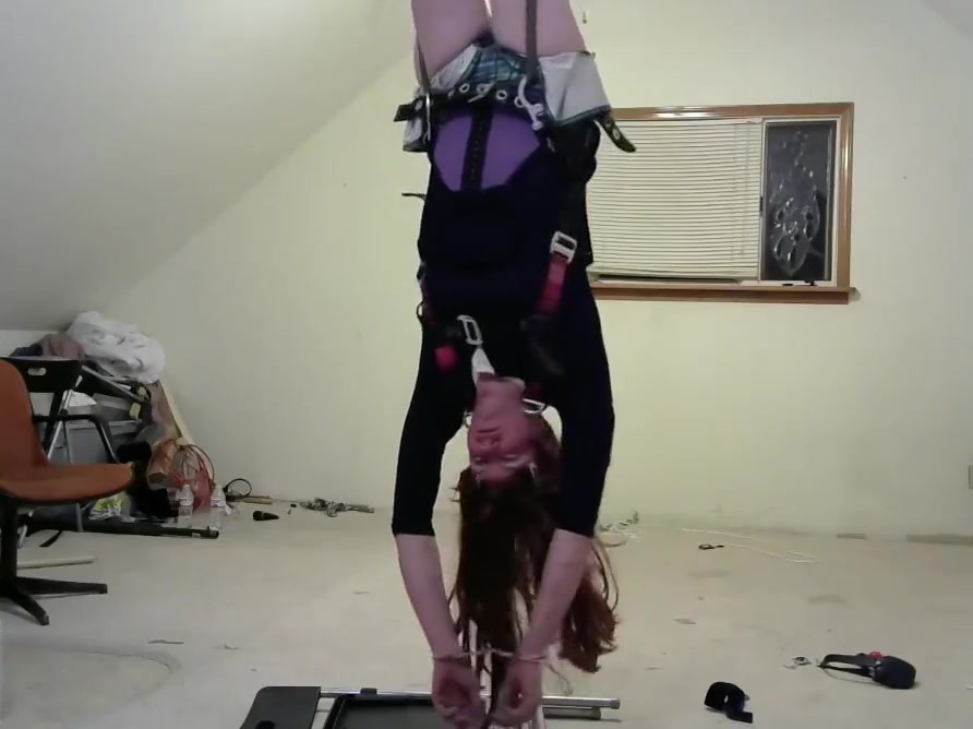 crossdresser in multiple bondage positions 3