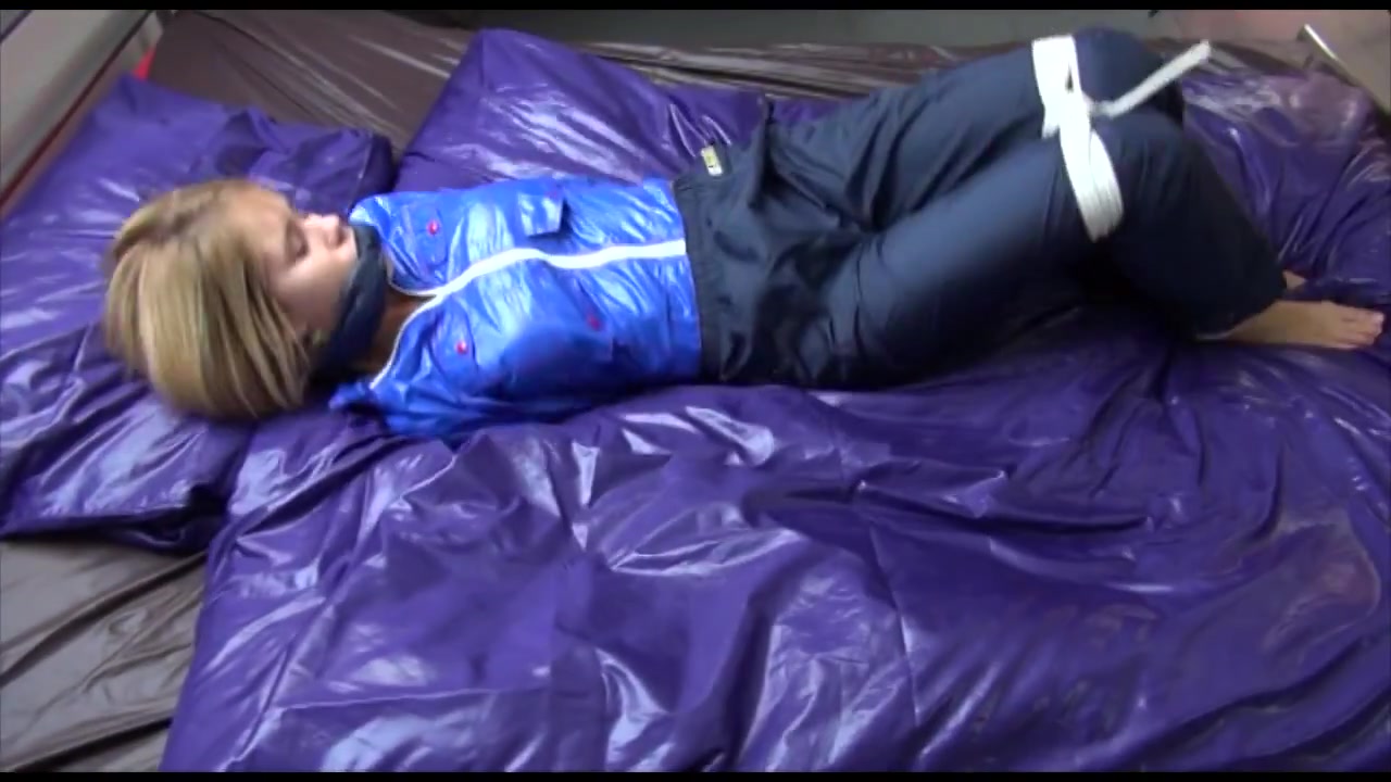 Get 3 Archive Video Clips With Samantha Enjoying Beeing Bound In Her Shiny Nylon Rainwear In One Package From 2012-2014
