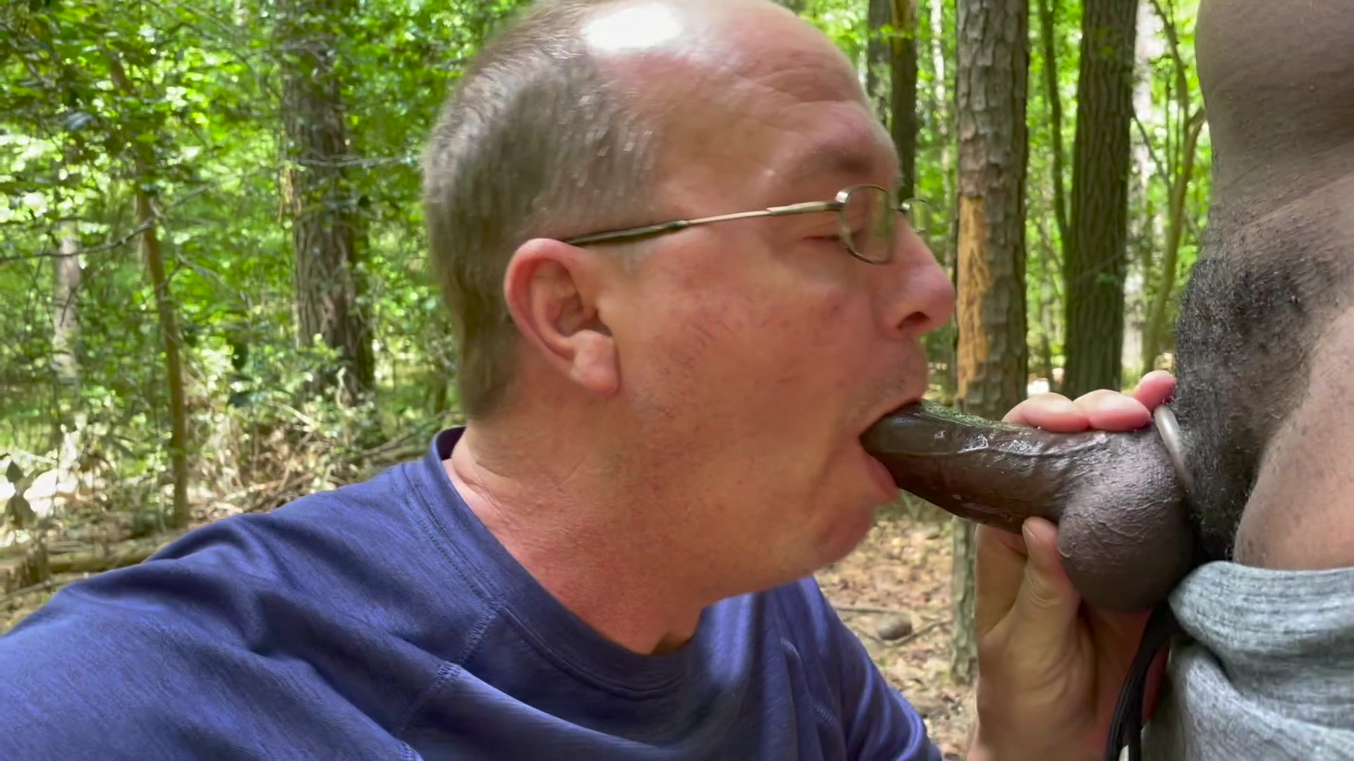 Brad sucks big black cocks in the woods