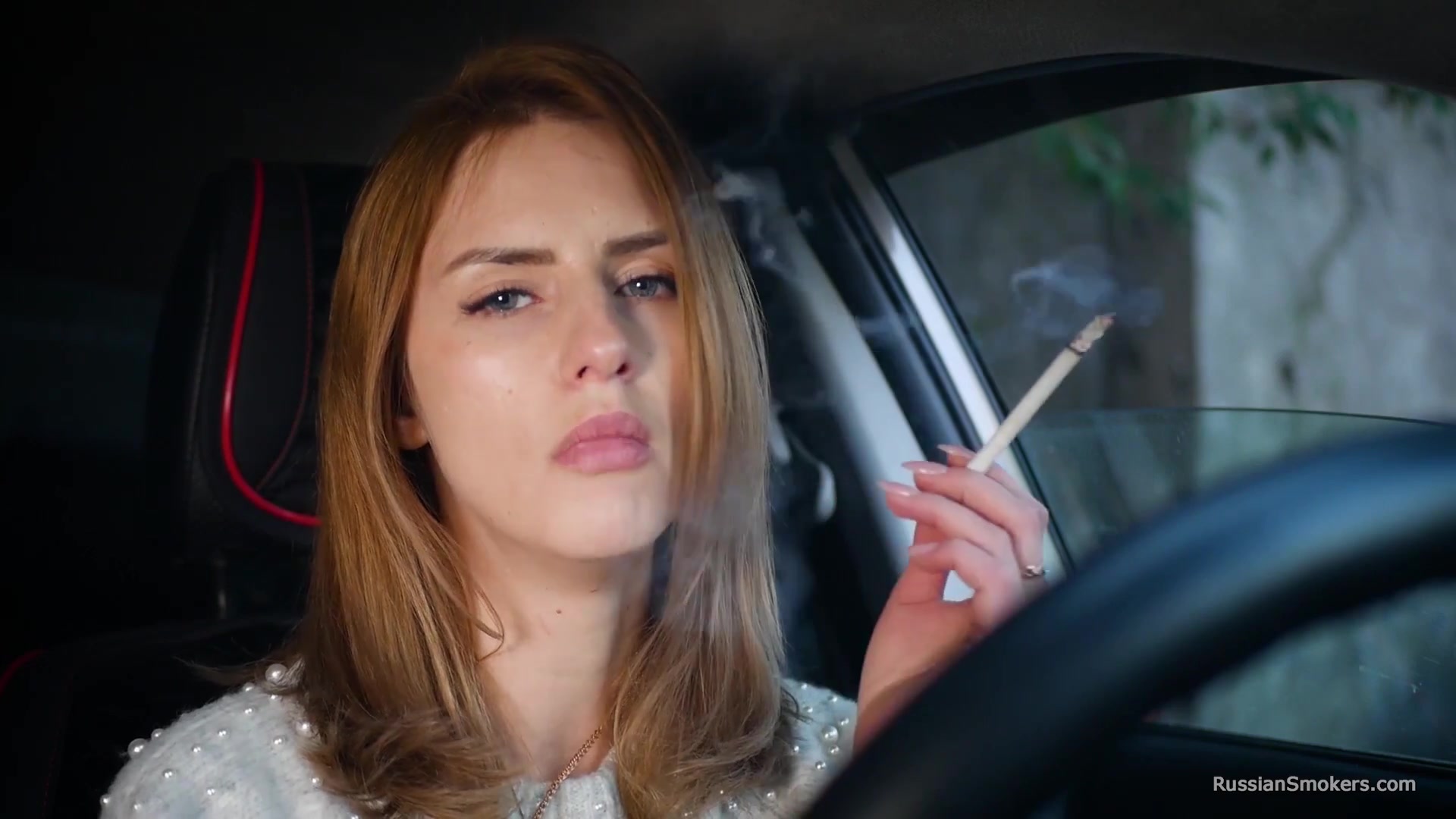 Meet Anastasia In Her Car While She Is Smoking Two 120mm All White Cigarettes