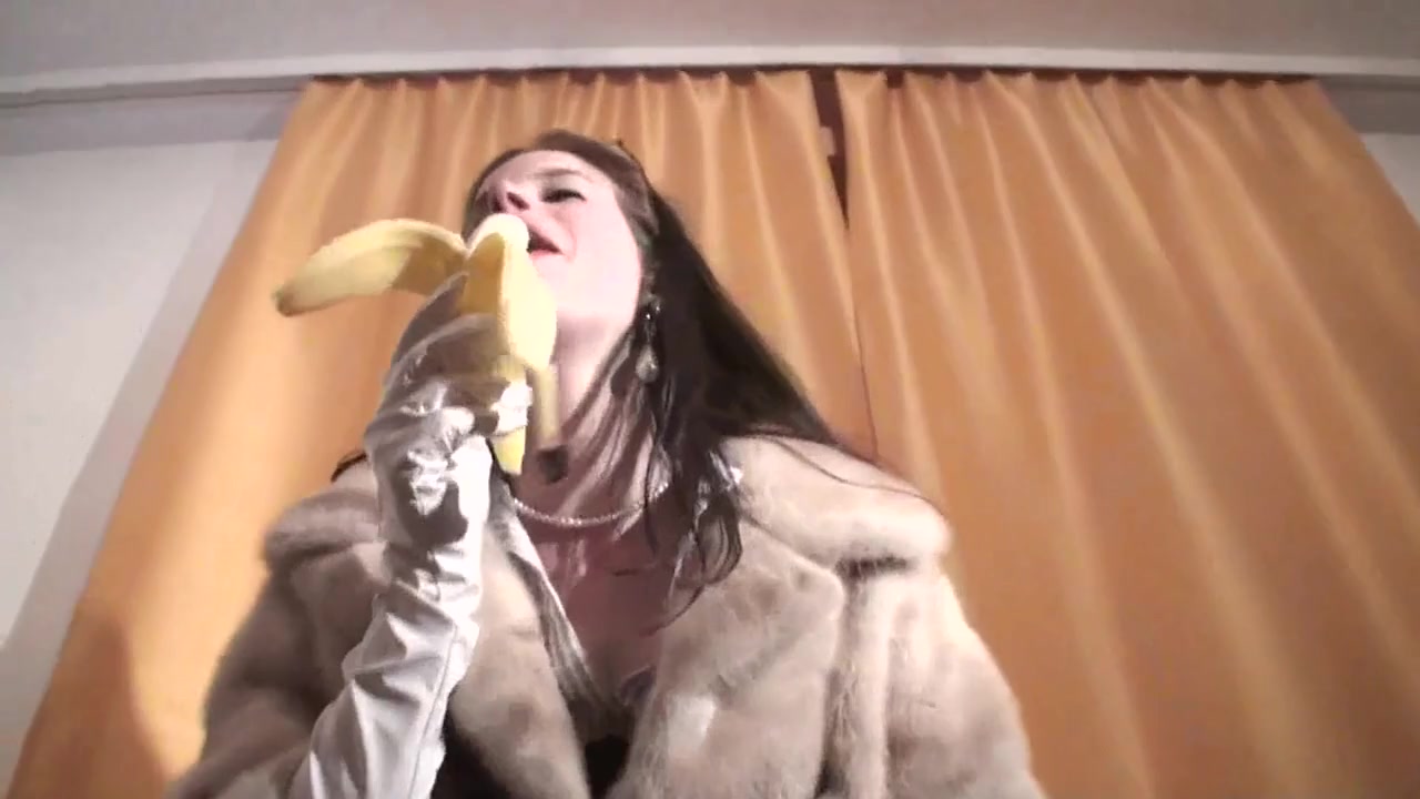 Spex brunette talking dirty while eating banana by Femdom Austria