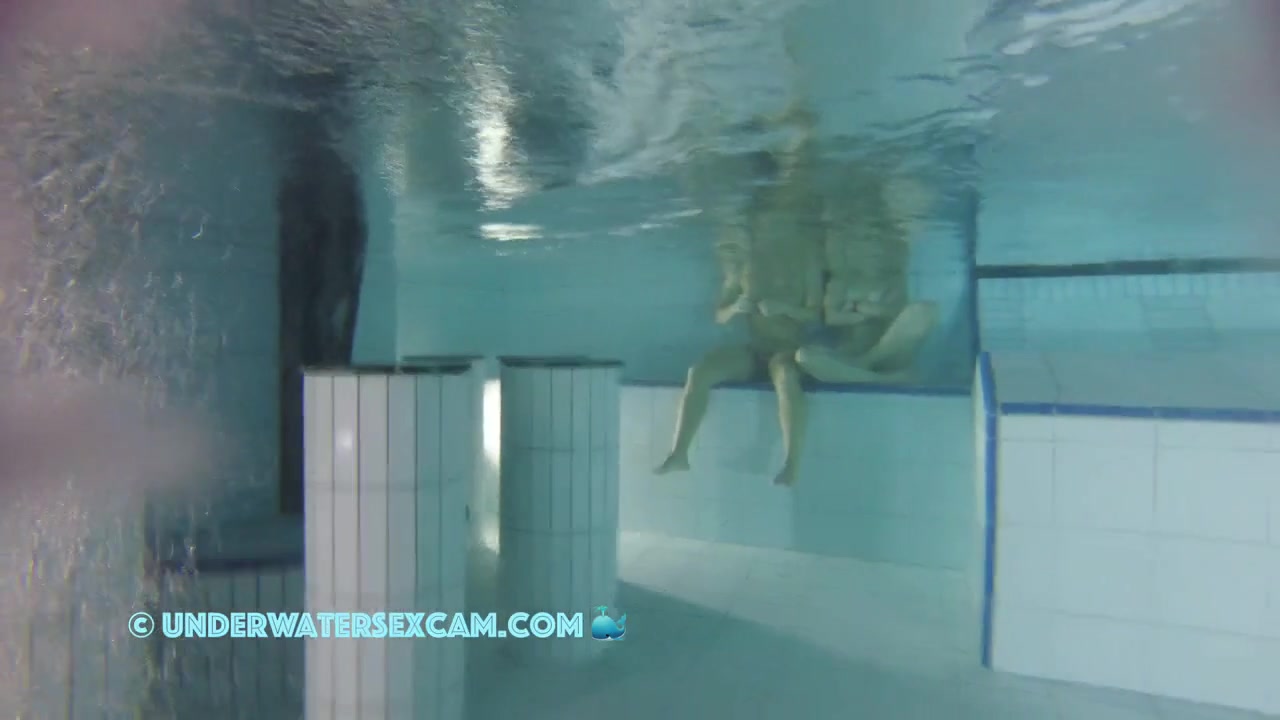 Sporty Couple Regenerating On An Underwater Bench