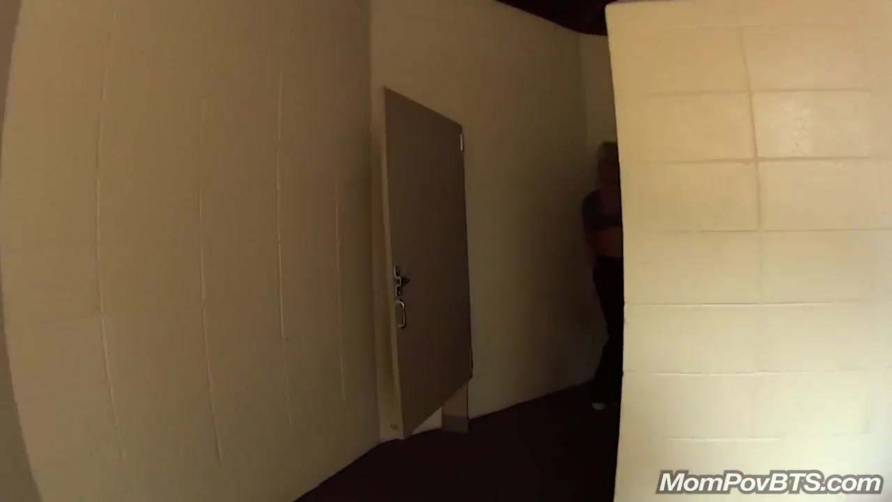 MILF fucks in public bathroom stall