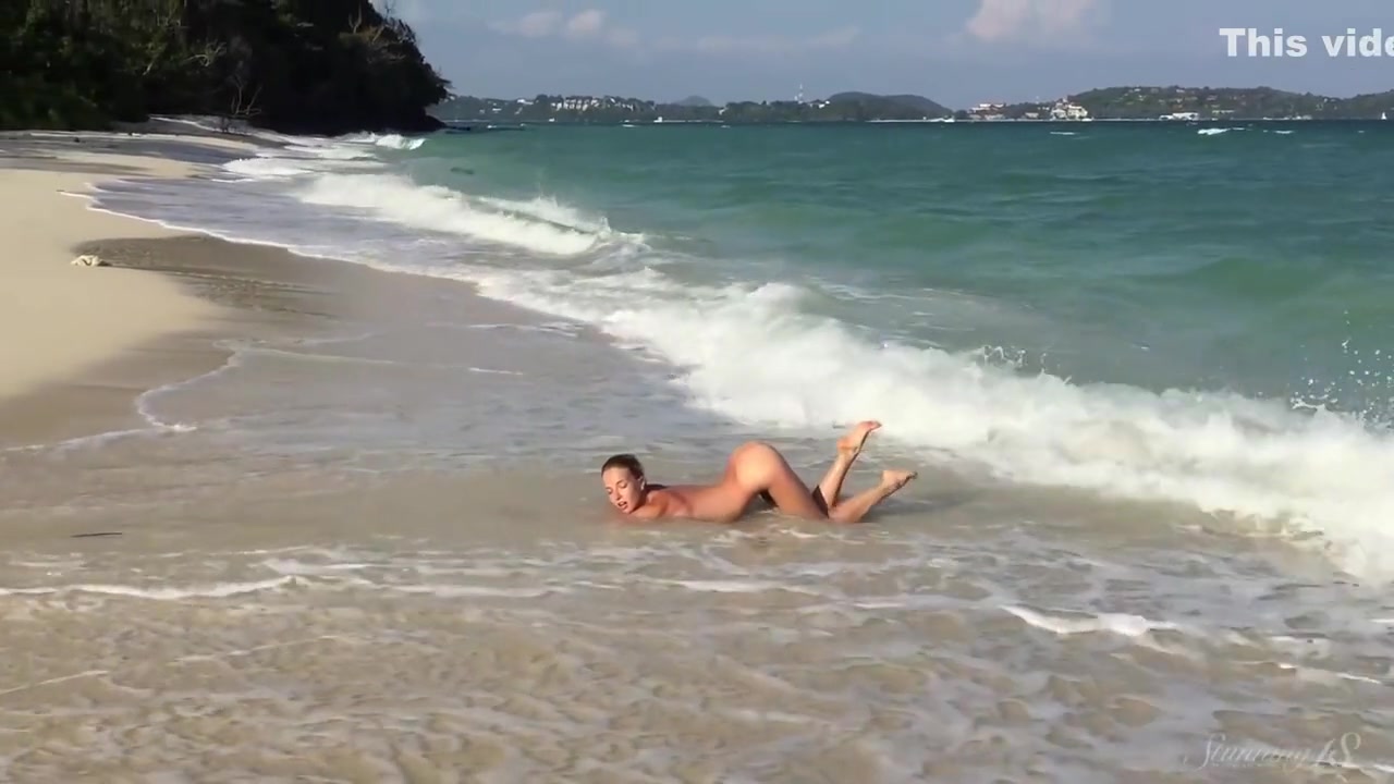 Divine Blonde With Large Breasts Naked At The Beach