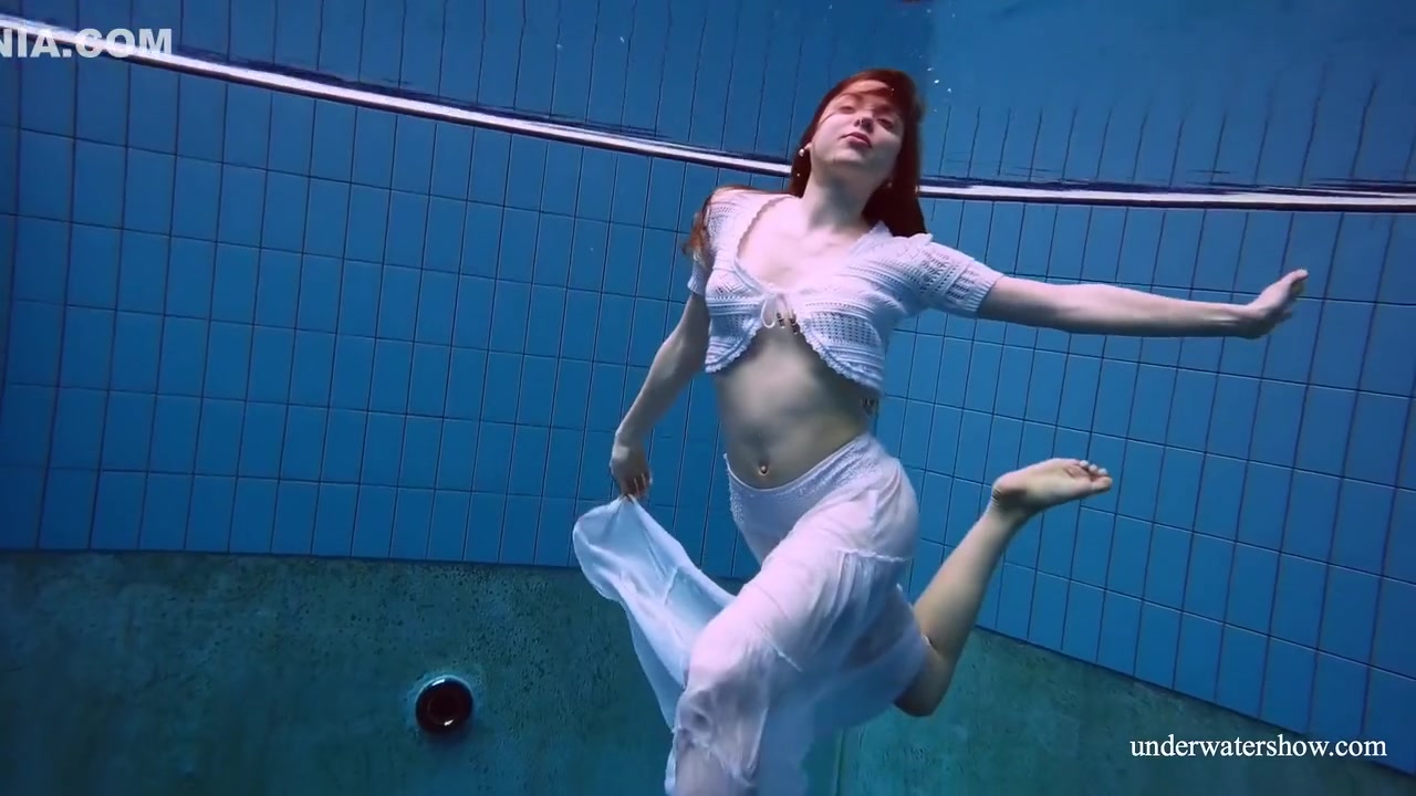 Redhead Marketa In A White Dress In The Pool