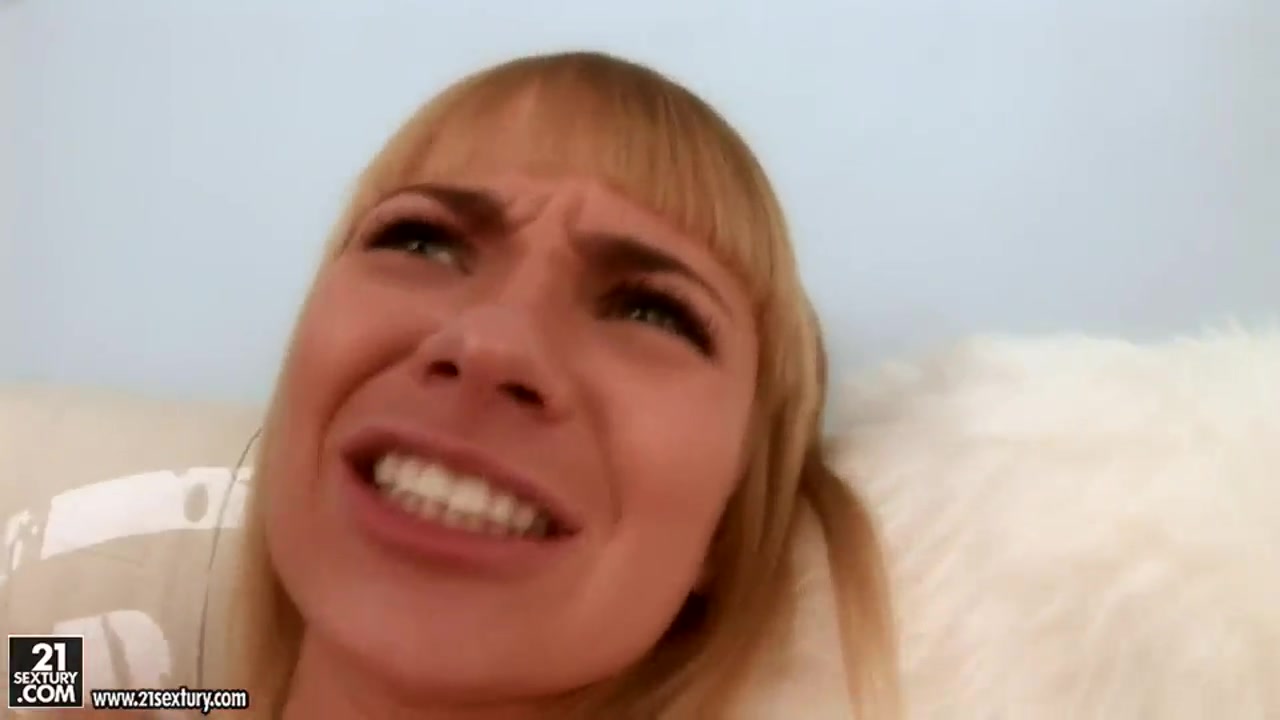 Blonde beauty pushes dildo into tight anal