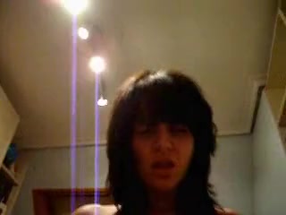 Brunette gropes her tits and moans from pleasure