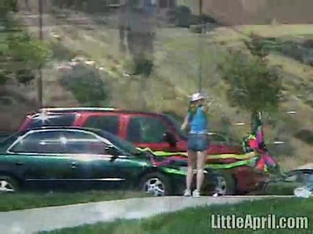 Cute Little April Outdoors Sucking A Popsicle