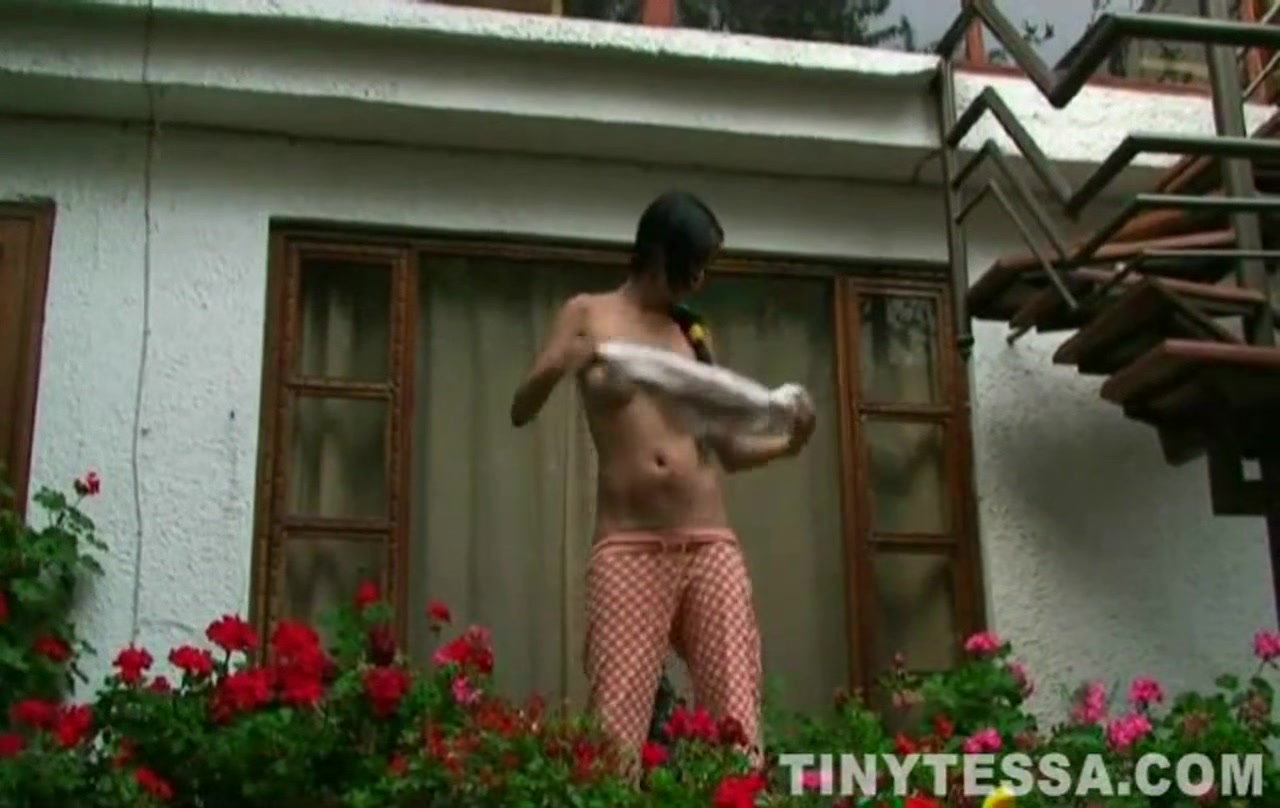Tiny Tessa masturbates in solo scene