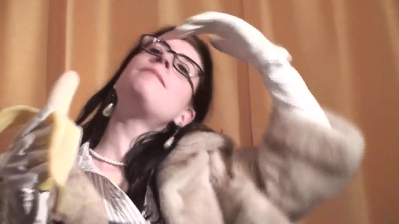 Spex brunette talking dirty while eating banana by Femdom Austria