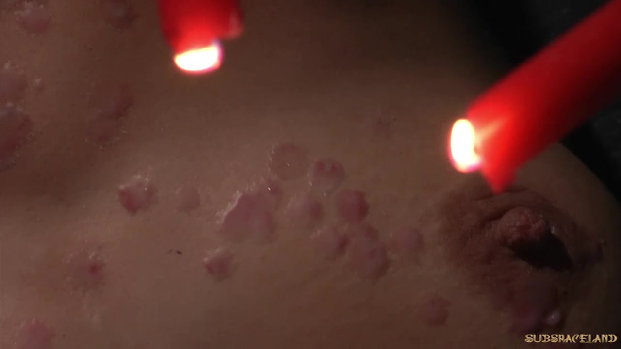 Redhead gets candle wax on her pussy has orgasm in BDSM