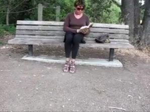 Lovely crossdresser jerks it on a park bench