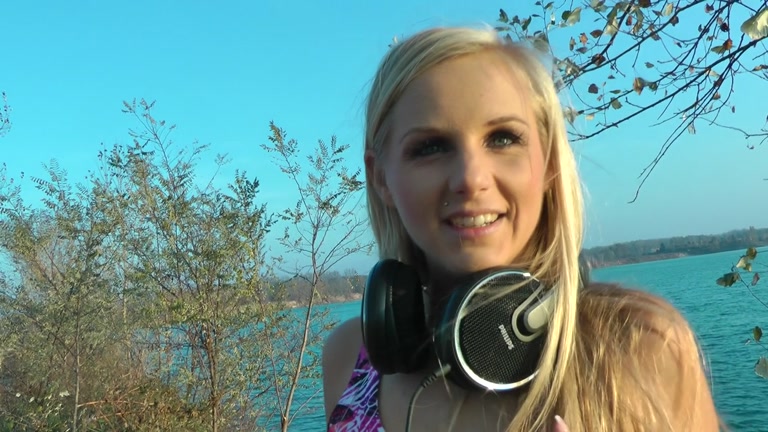 Blonde sucking near the lake