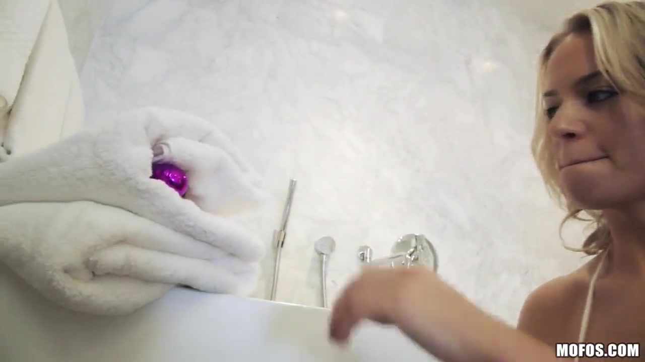 Young petite Britney Belle plays with dildo