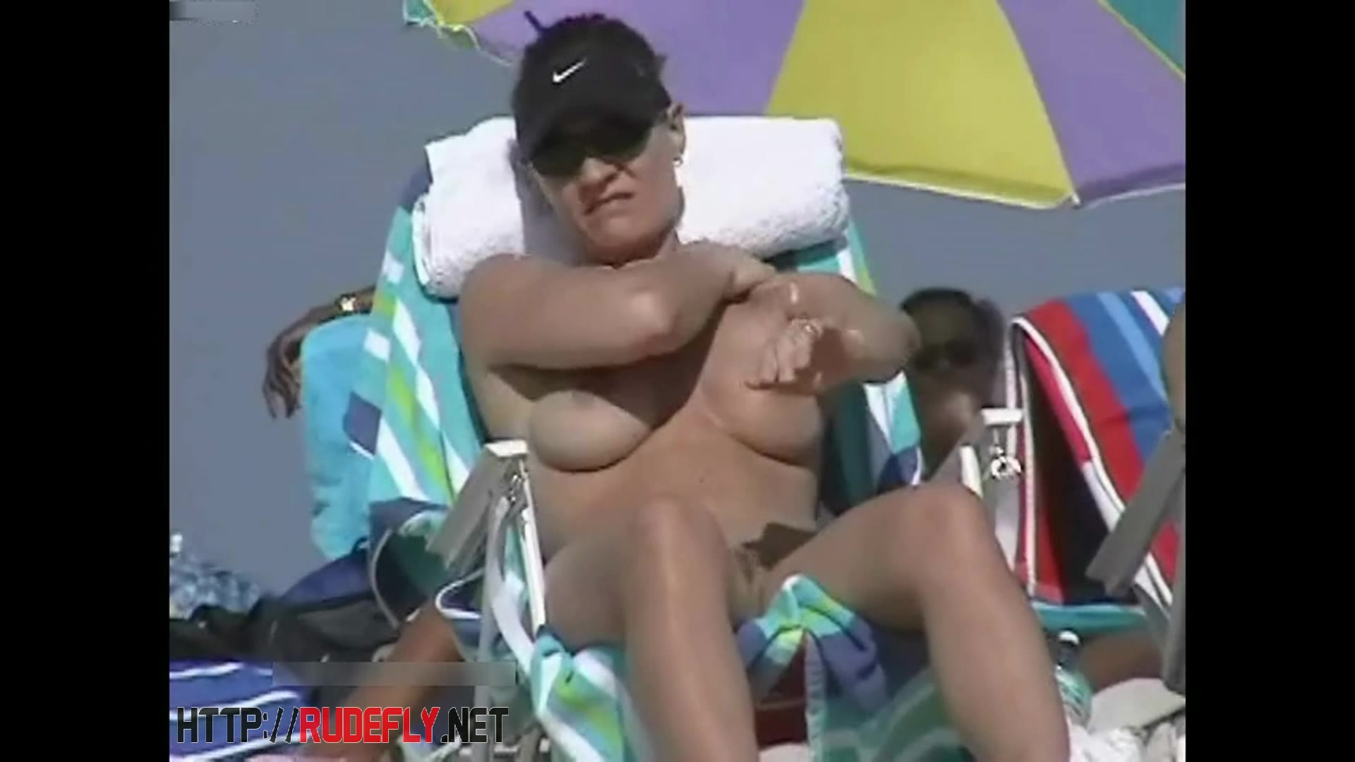 Couple split by Strangers on a nude beach