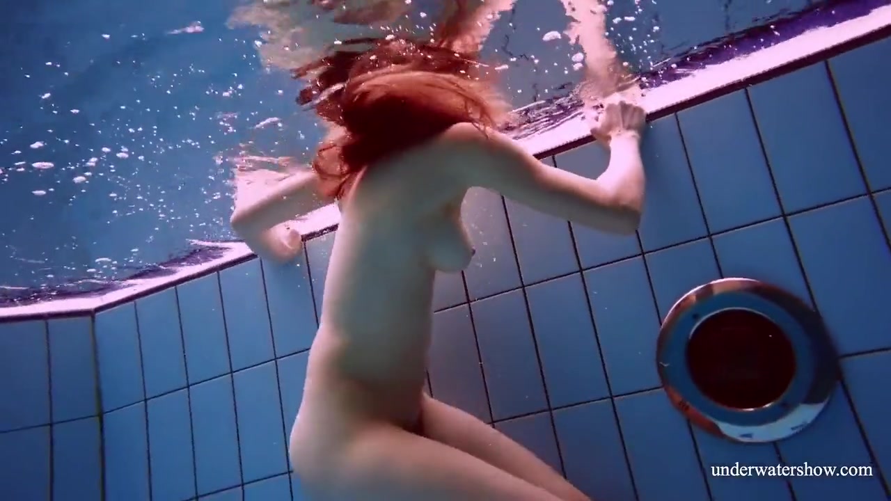 Redhead Marketa In A White Dress In The Pool