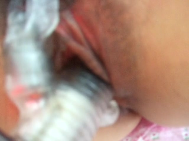 Hairy pussy toyed by a strange looking vibrator