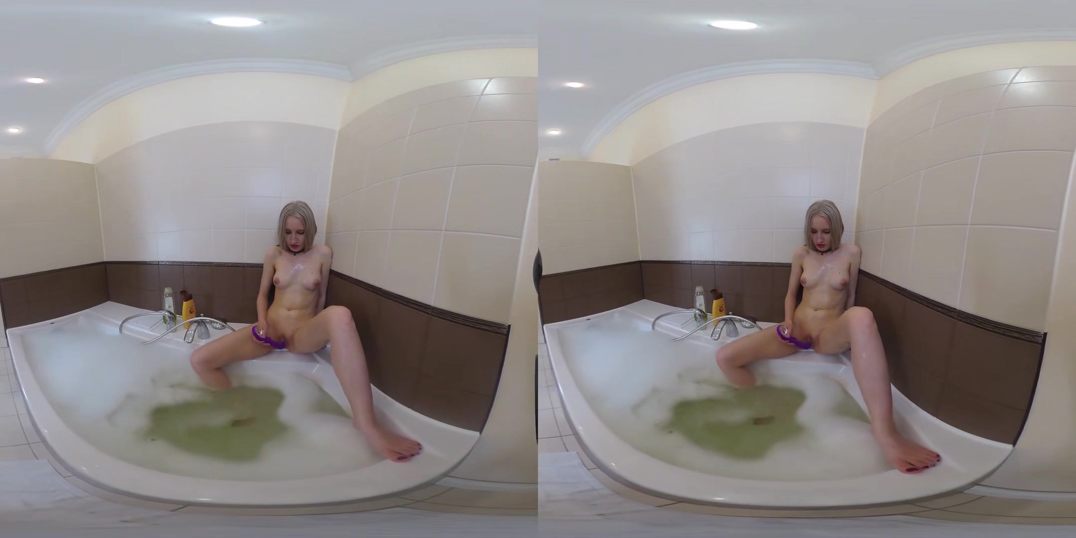 Blonde In Bathroom With Toy