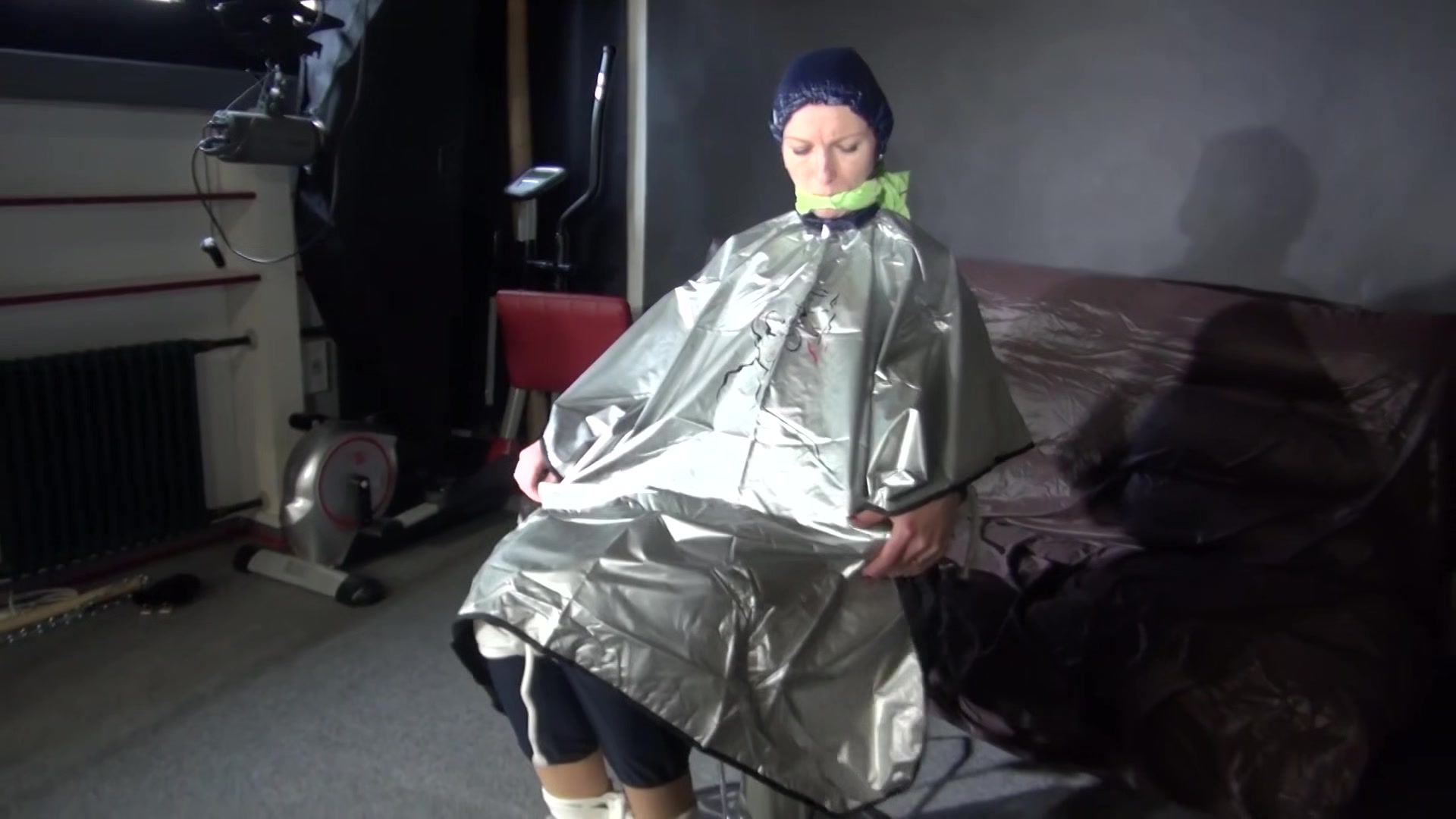 Sexy Ronja Being Tied, Gagged And Hooded On A Chair With A Clothgag Wearing Sexy Blue Shiny Nylon Rainwear (Video)