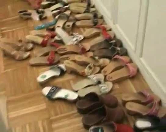 Lovely woman trys on different shoes in the foot fetish vid