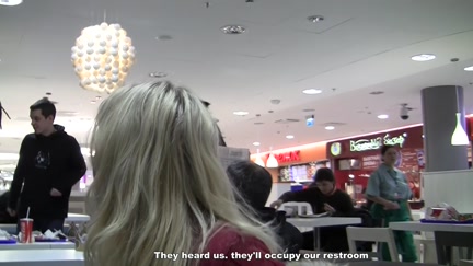 2 blond engulfing penis in a McDonald's WC