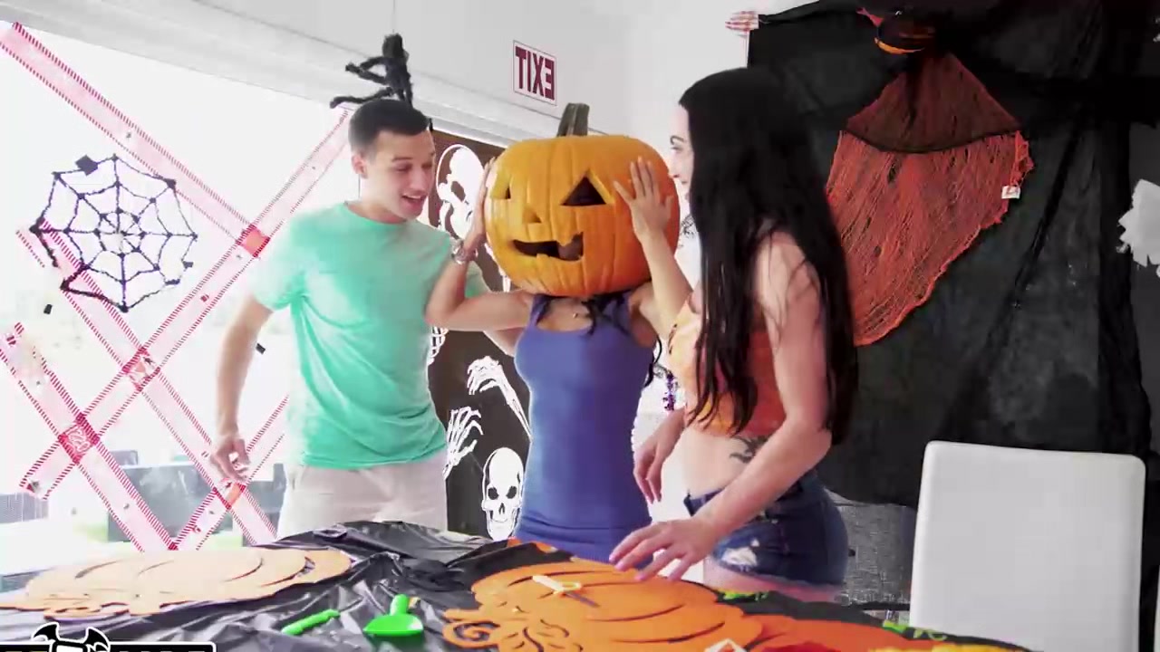 carving pumpkins with her stepson and stepdaughter