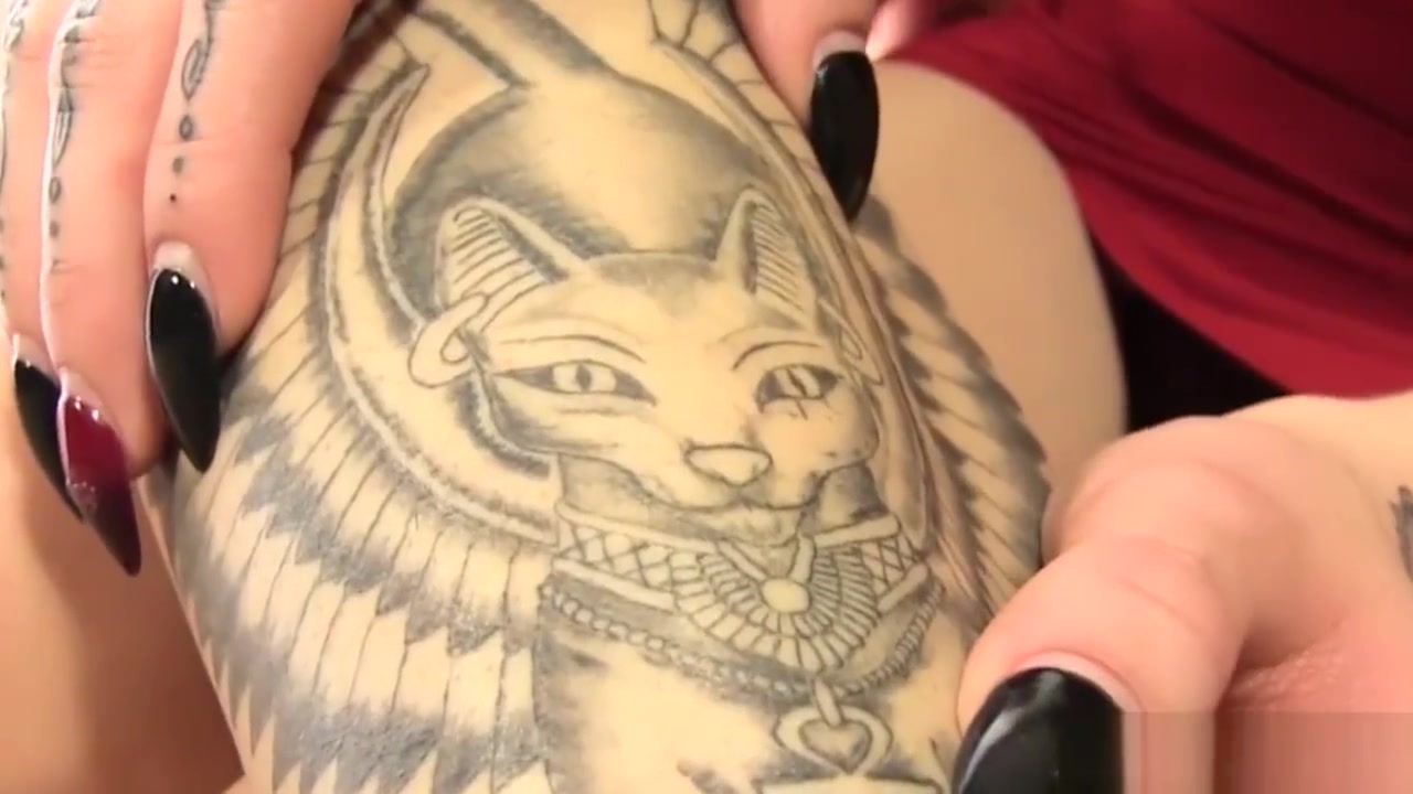Rimming inked tranny twosome jerking cocks