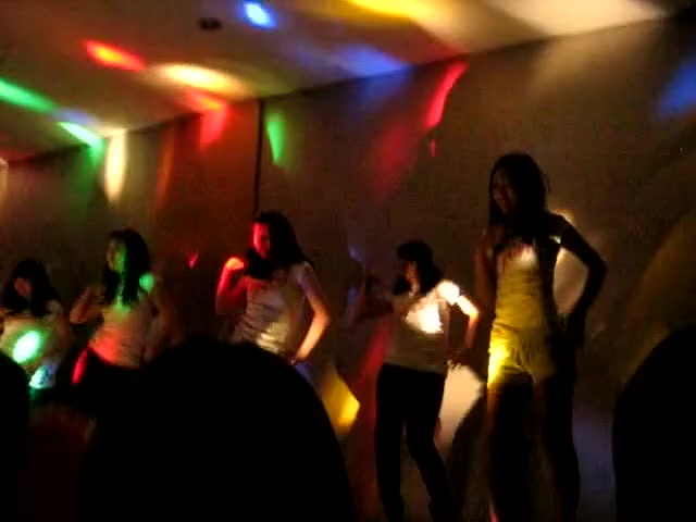 Asian dude filming his girl tired after dance show