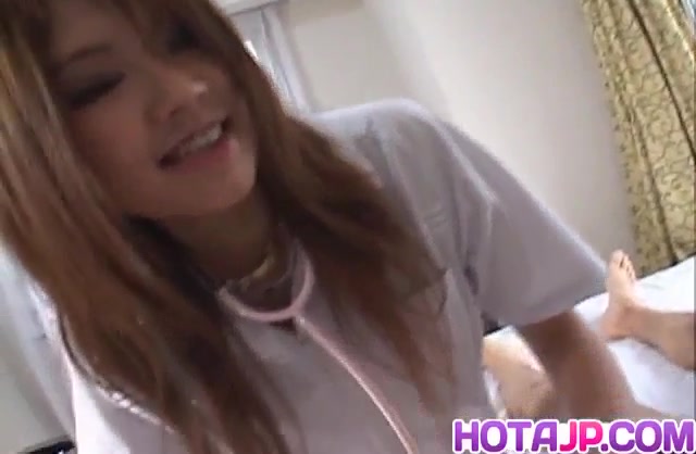 Ai Niimura nurse in fishnets sucks boner