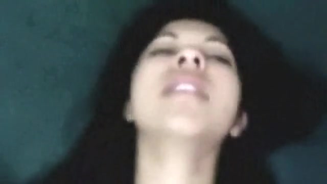 Young Latina spreading her legs and masturbating with a sex toy
