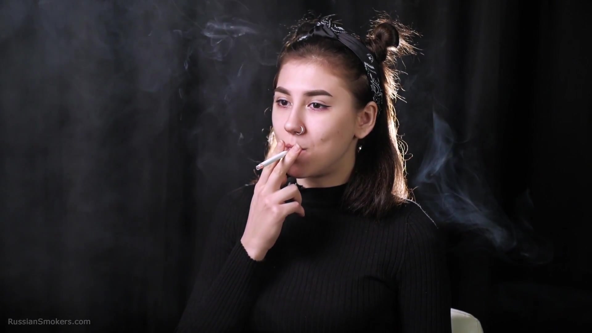 Alina Is Smoking One And A Half Cigarette
