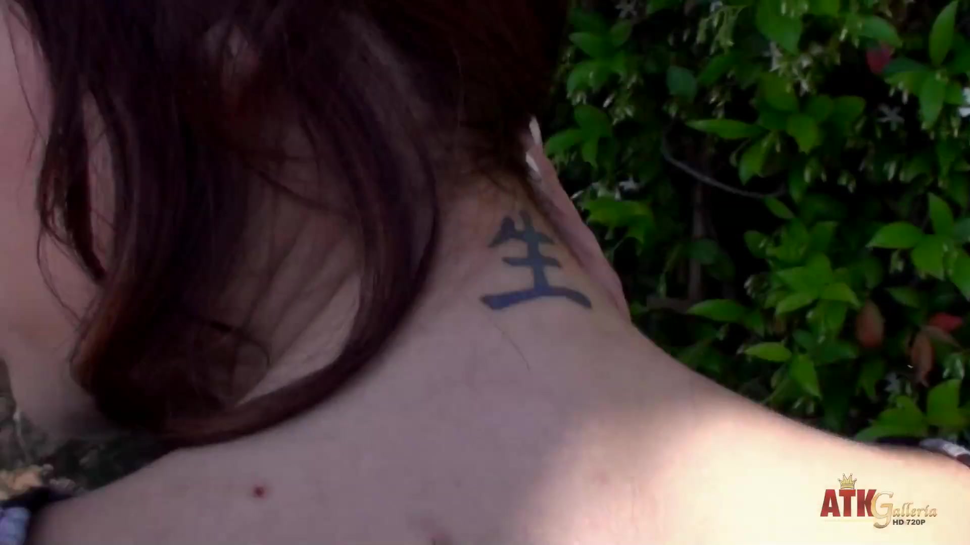 Sweet Maryjane Johnson smoking a cigarette and showing her small tits