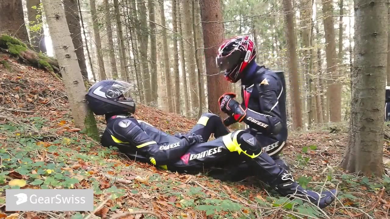 German dainese bikers having fun in the wood