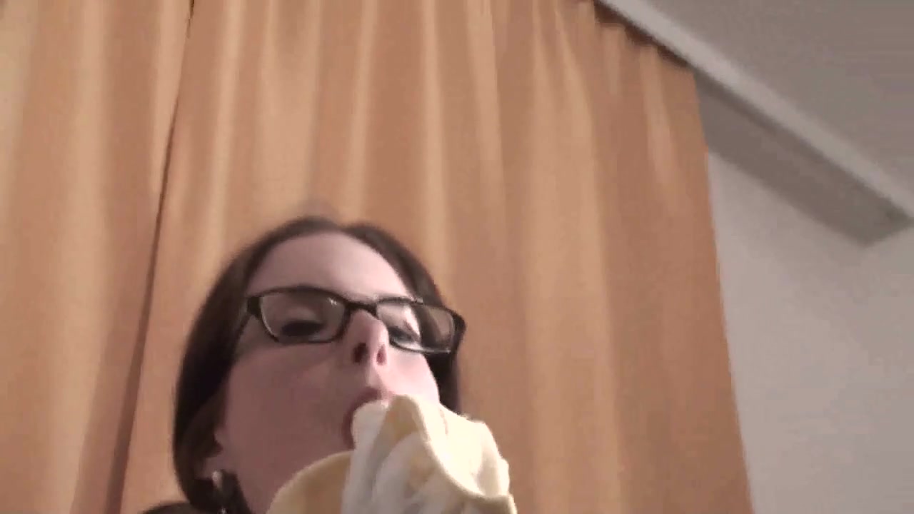 Spex brunette talking dirty while eating banana by Femdom Austria
