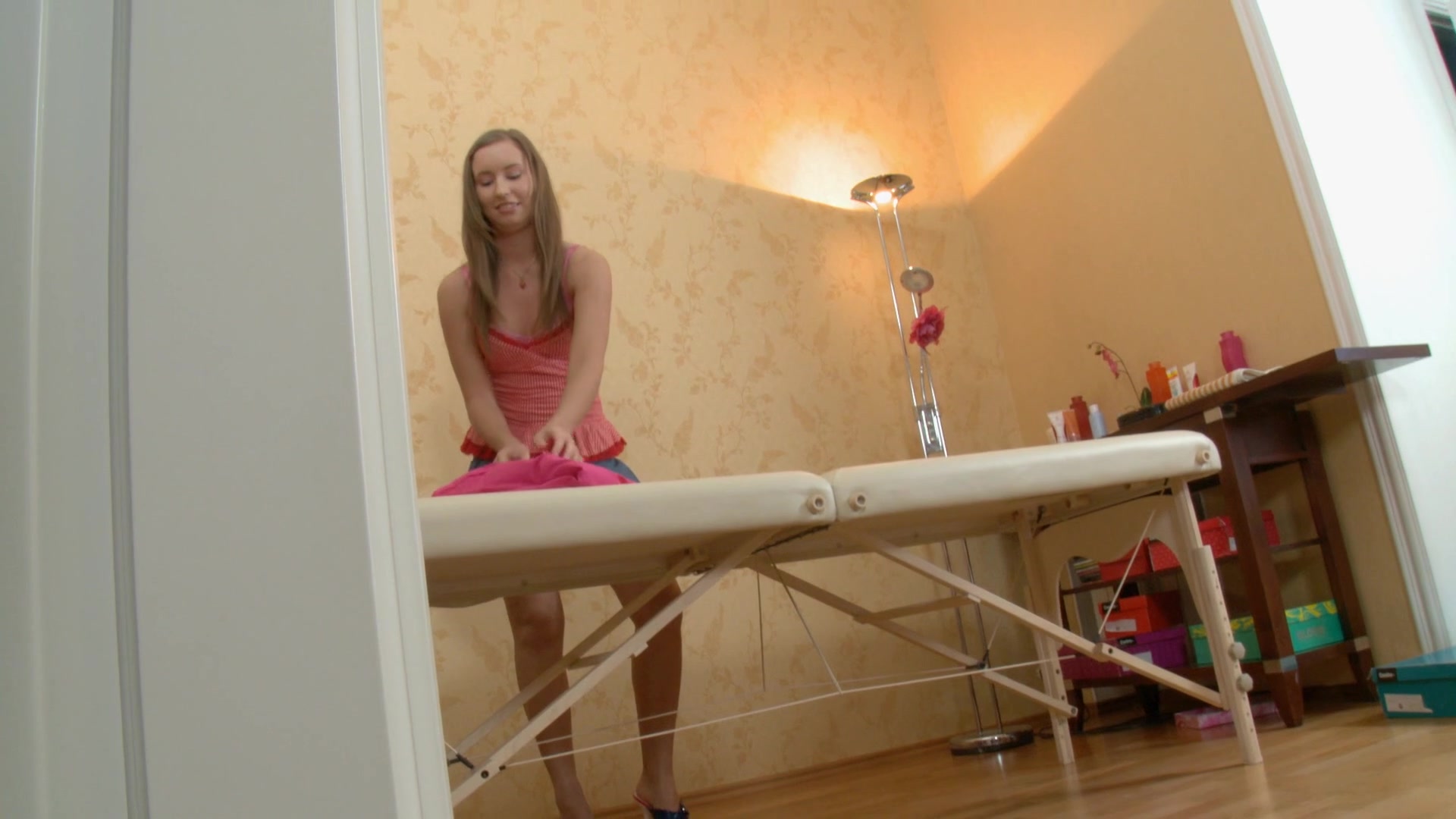 Hot angel masturbated in massage table and sucks strapon untill cock juice