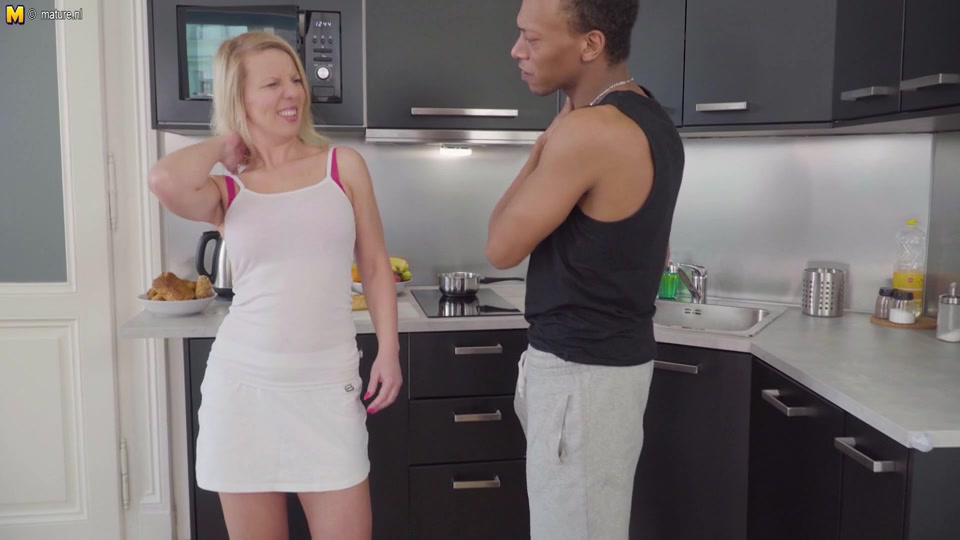 Big dicked black guy fucking a MILF in her kitchen