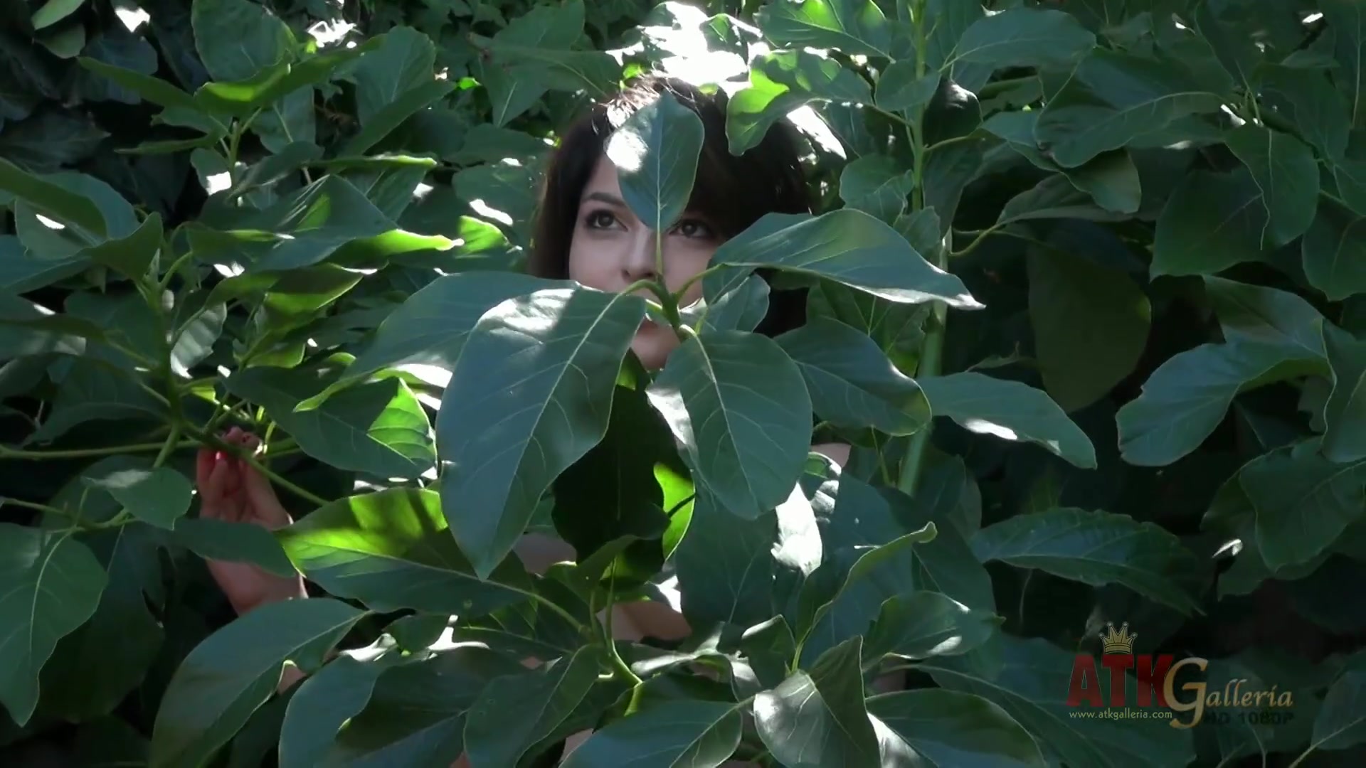 Phoebe is outside getting naked for a photo shoot