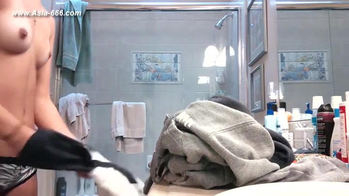 peeping blonde amateur change undies in bathroom.***