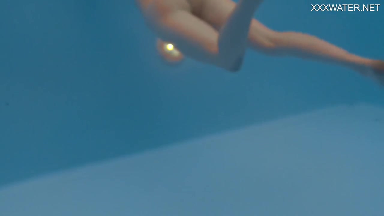 Petite Russian Marfa Swims Nude In The Pool