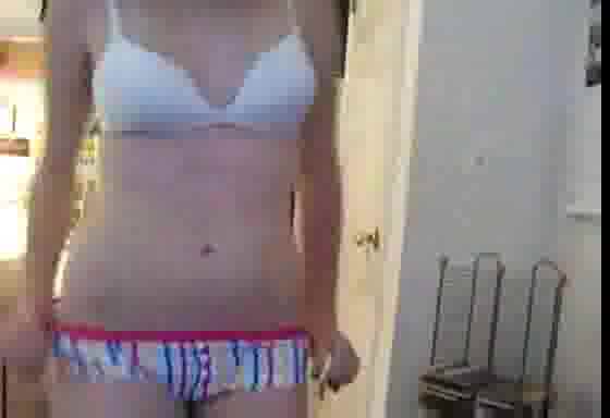Pussycat poses in front of the webcam in stripped undies